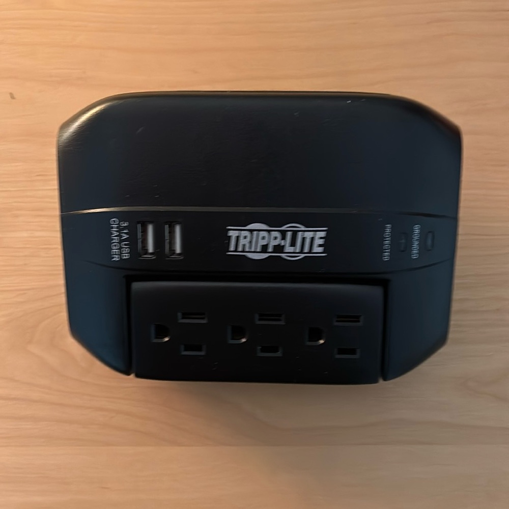Tripp-Lite surge protector model: swivel6USB 3 3-prong sockets & 2 3.8 USB slots